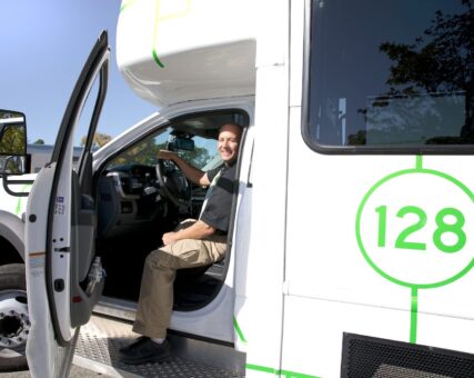 One of our very friendly Grid drivers greeting a rider