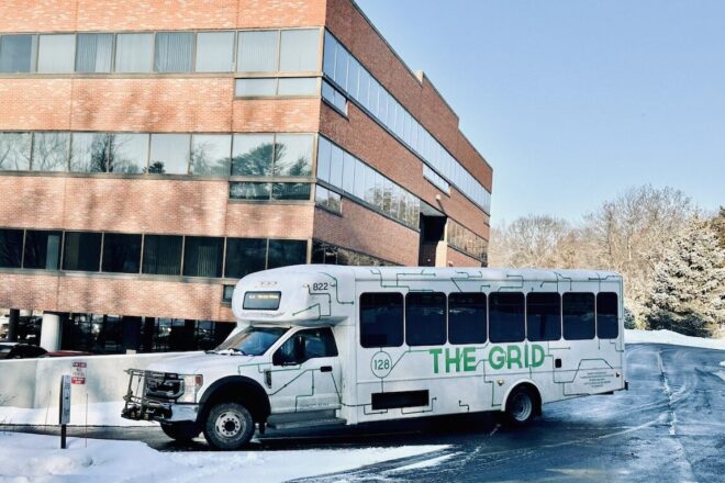 Grid vehicle pulling into the 80 Hayden Avenue parking lot with nice morning light.