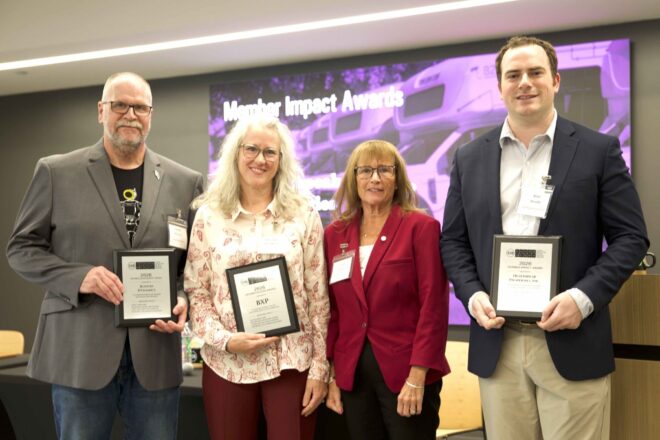 Representatives from Boston Dynamics, BXP, and Healthpeak accept 2026 Member Impact Awards