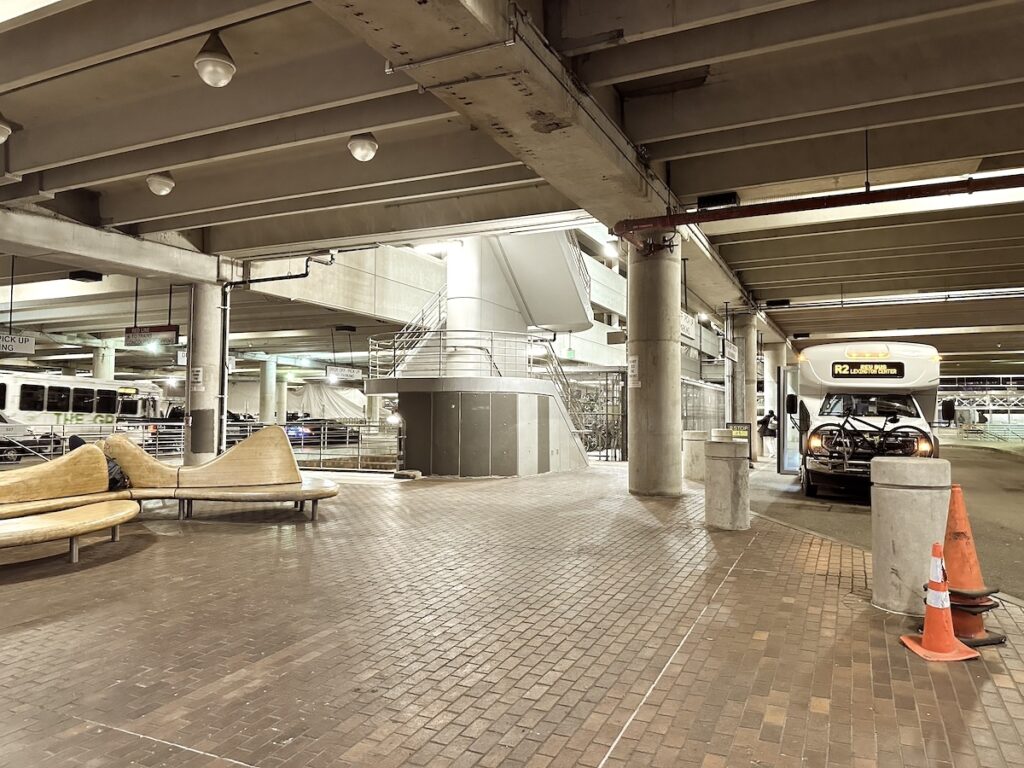 Photo taken inside the Alewife Station garage, looking toward the central stairwell.