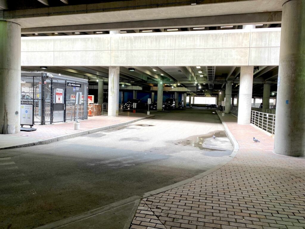 Photo directed toward the bike cages in the Alewife Station garage.
